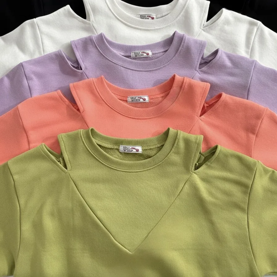 Stack of crew-neck sweatshirts in black, white, lilac, coral and olive