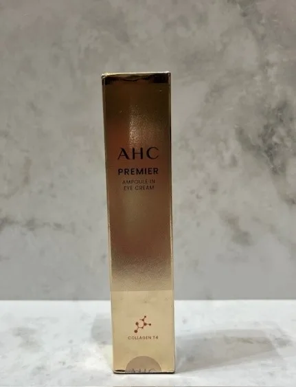 AHC Premier Ampoule In Eye Cream 40ml — A collagen eye cream with a concentrated ampoule suspended inside it, aimed at t