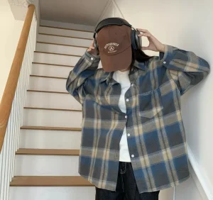 Oversized Brushed Flannel Shirt — A soft brushed flannel in oversized plaid, with button cuffs and a chest pocket. Chest