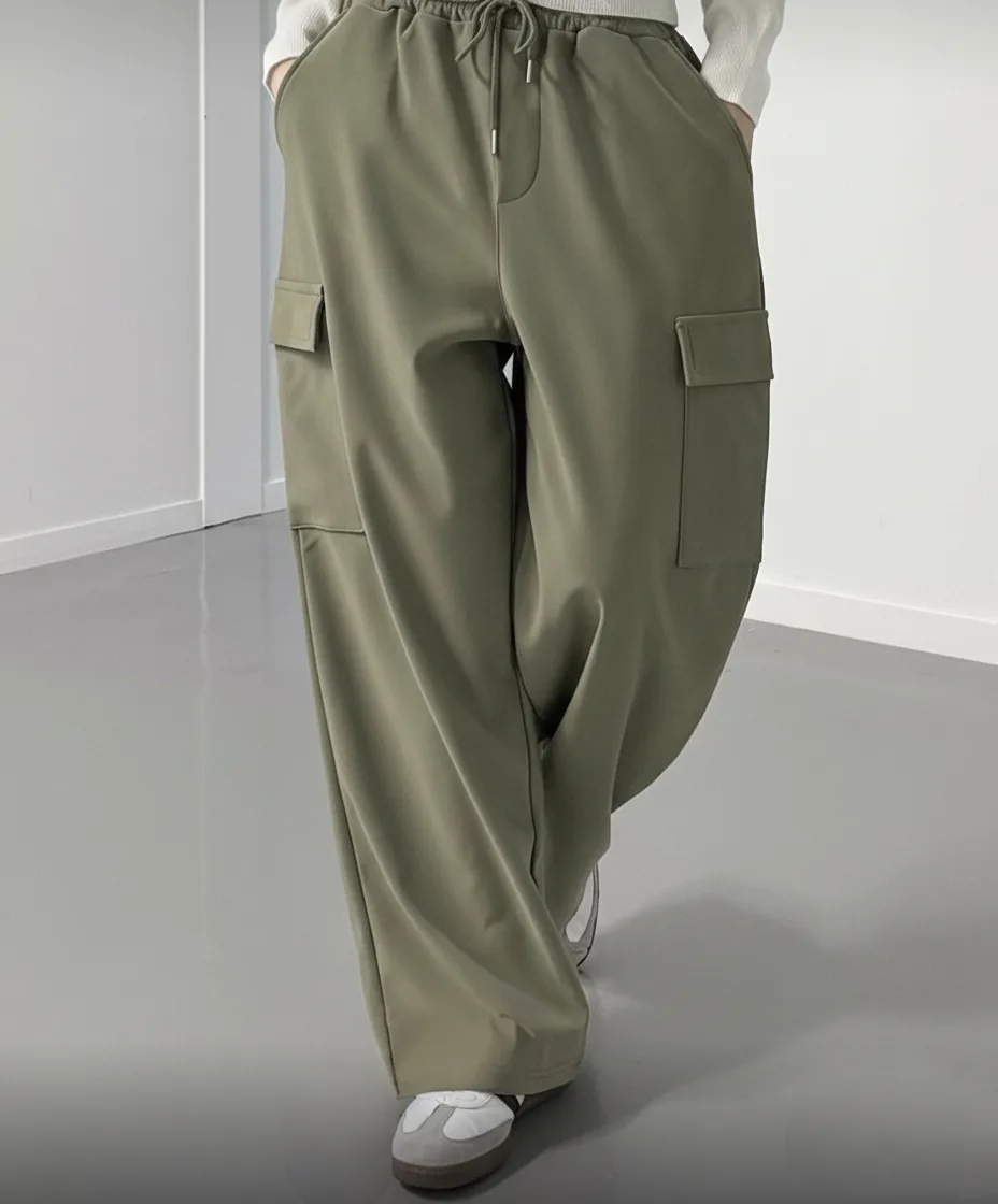 Wide-Leg Cargo Trousers — Soft wide-leg cargos with flap pockets and a drawstring elastic waist. Three sizes covering a