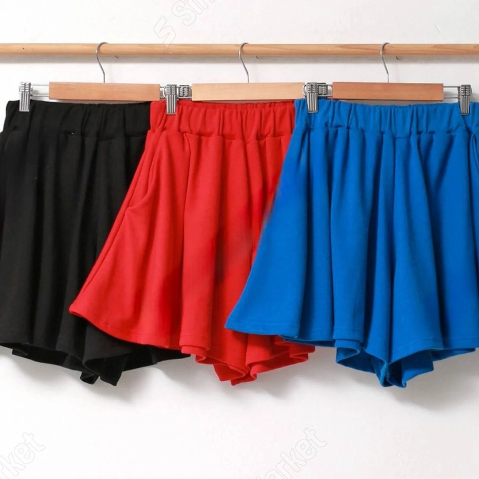 Flared Skater Skirt Flared Skater Skirt — A short flared skirt with a smooth elastic waist, in black, red or cobalt blue. Double knit with r