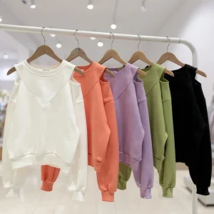 Cold-Shoulder Sweatshirt — A soft crew-neck sweatshirt with cut-out shoulders and a V-detail at the neck. Chest 27–42 in