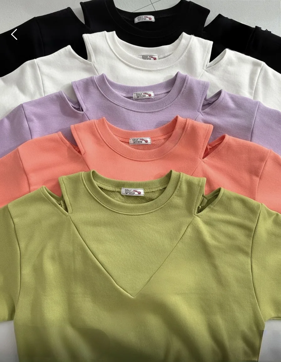 Cold-Shoulder Sweatshirt — A soft crew-neck sweatshirt with cut-out shoulders and a V-detail at the neck. Chest 27–42 in