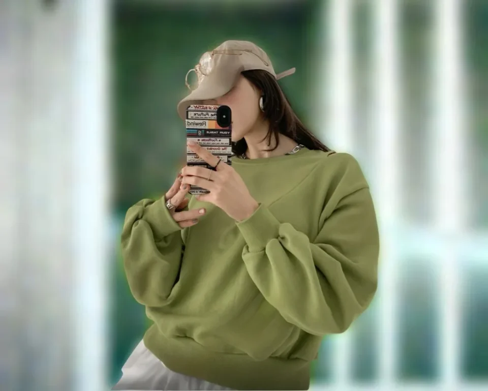 Cold-Shoulder Sweatshirt — A soft crew-neck sweatshirt with cut-out shoulders and a V-detail at the neck. Chest 27–42 in