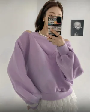 Cold-Shoulder Sweatshirt — A soft crew-neck sweatshirt with cut-out shoulders and a V-detail at the neck. Chest 27–42 in