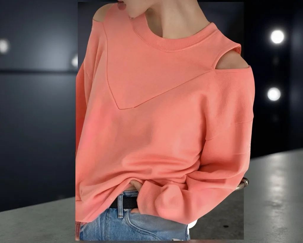 Cold-Shoulder Sweatshirt Cold-Shoulder Sweatshirt — A soft crew-neck sweatshirt with cut-out shoulders and a V-detail at the neck. Chest 27–42 in
