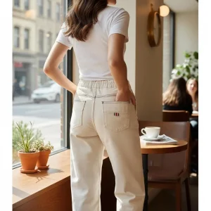 High-Rise Straight-Leg Jeans — High-rise straight-leg jeans with an elastic back waist. Rise 11 inches, inseam 24 inches