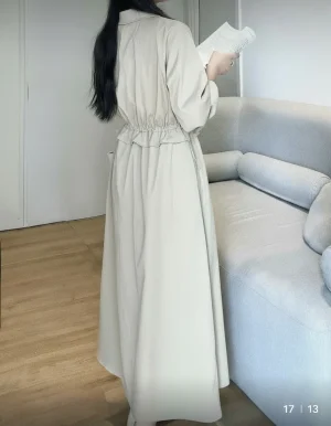 Long-Sleeved Maxi Shirtdress — A full-length shirtdress in a light woven cotton blend, with a drawstring waist, chest po
