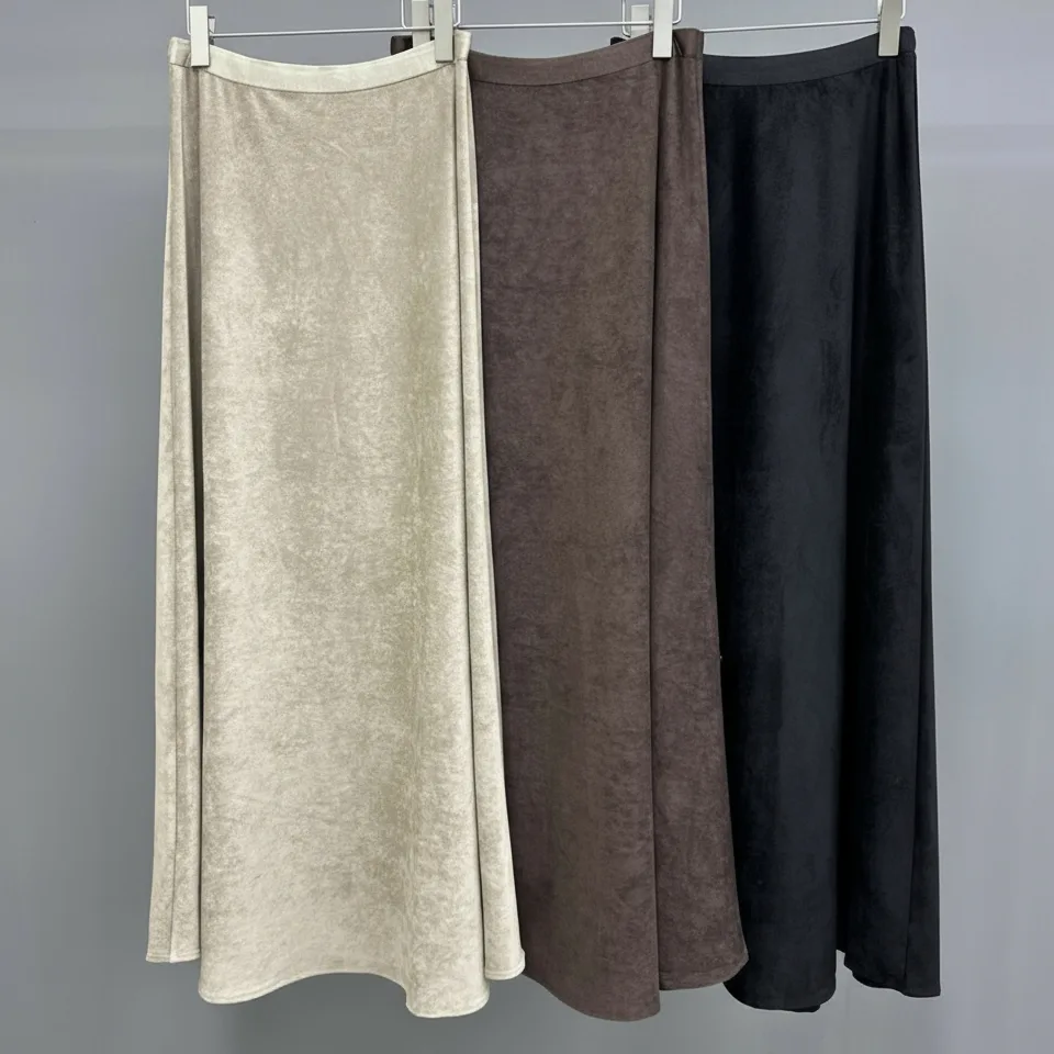 Faux Suede A-Line Maxi Skirt — A brushed faux-suede maxi with an elastic waist. Waist 26–32 inches, length 37 inches. Br