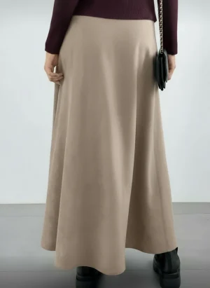 Faux Suede A-Line Maxi Skirt — A brushed faux-suede maxi with an elastic waist. Waist 26–32 inches, length 37 inches. Br