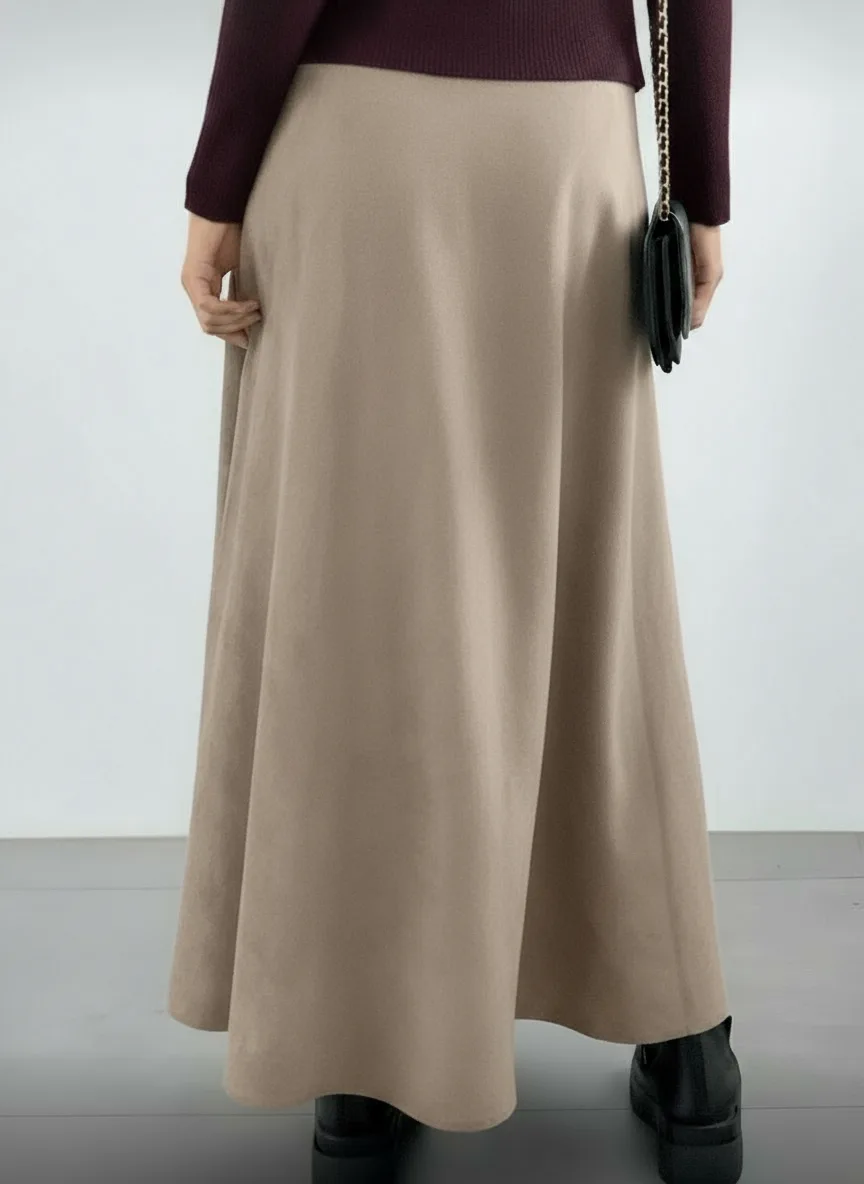 Faux Suede A-Line Maxi Skirt Faux Suede A-Line Maxi Skirt — A brushed faux-suede maxi with an elastic waist. Waist 26–32 inches, length 37 inches. Br