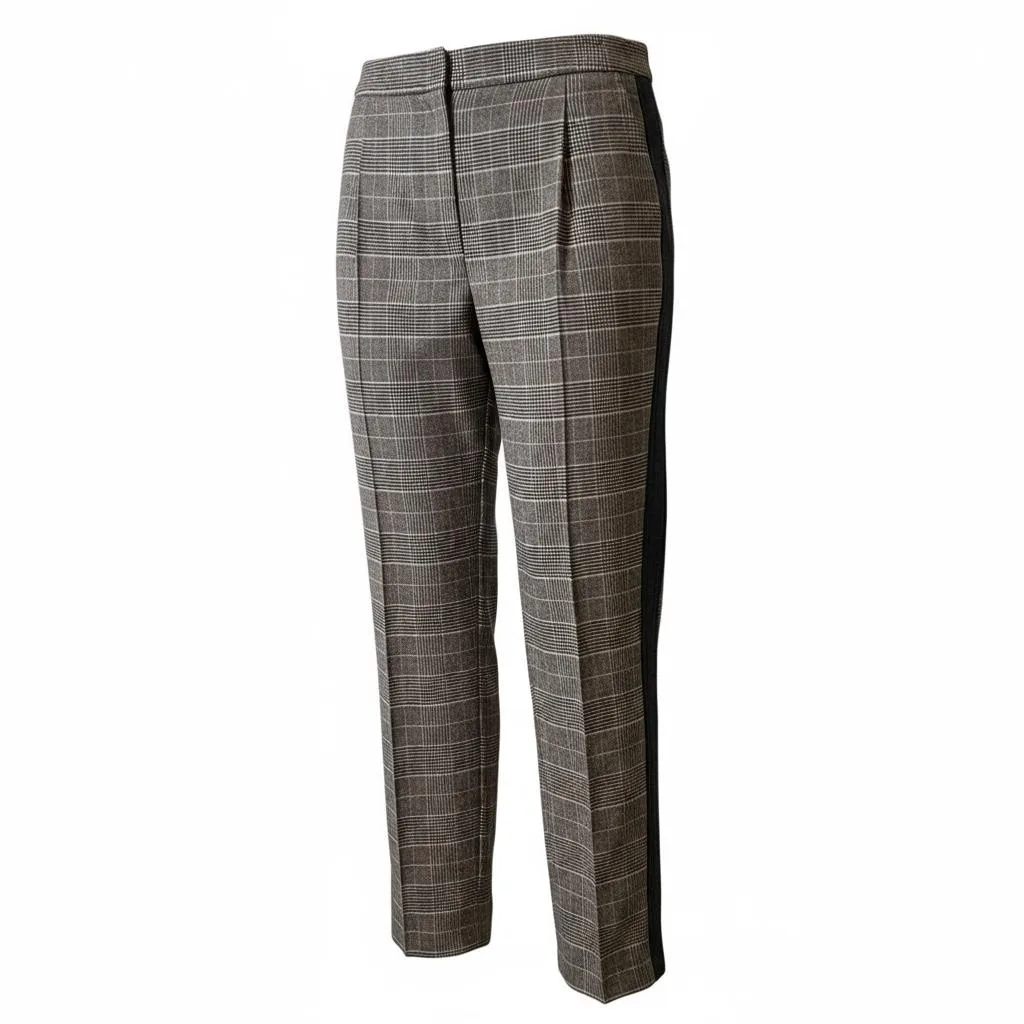 Plaid Wool-Blend Trousers Plaid Wool-Blend Trousers — Charcoal, navy and ivory check trousers with a slim leg and a hidden elastic back waist. Ins