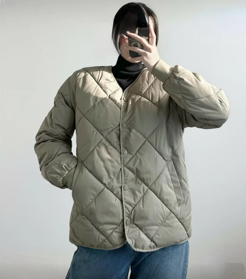 Quilted Liner Jacket Quilted Liner Jacket — A light diamond-quilted jacket that layers under a coat or stands on its own. Cream or sage. Butt