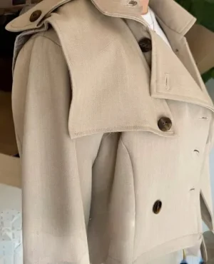Cropped Trench and Skirt Set — A cropped double-breasted trench jacket with a matching asymmetric mini skirt. Black or b