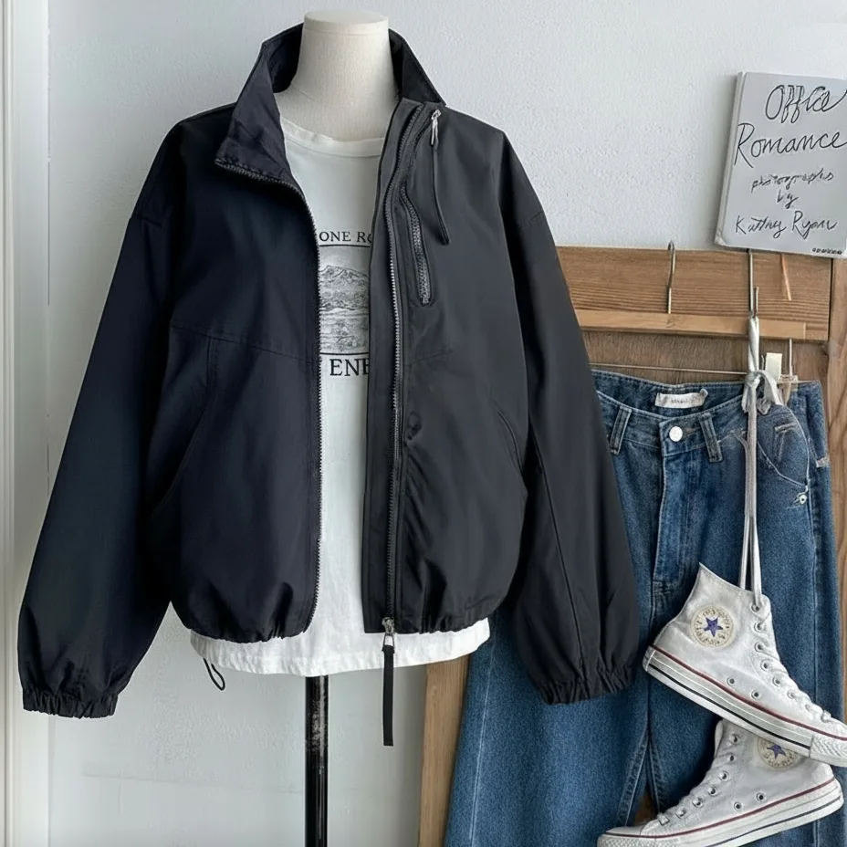 Full-Zip Windbreaker Jacket — A cropped full-zip windbreaker with a stand collar, elasticated cuffs and hem, and zip poc