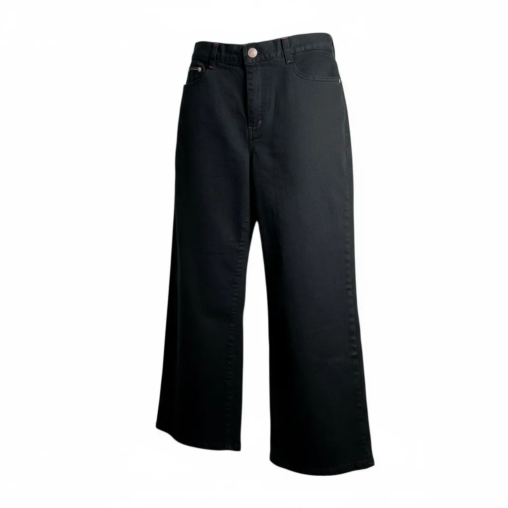 Midnight Wide-Leg Jeans Midnight Wide-Leg Jeans — Deep indigo wide-leg jeans cut high at the waist and falling straight and full to the hem. Cut