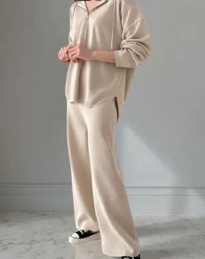 Rib-Knit Hooded Lounge Set — A half-zip hooded rib-knit top with matching wide-leg trousers. Mocha, black or beige. One 
