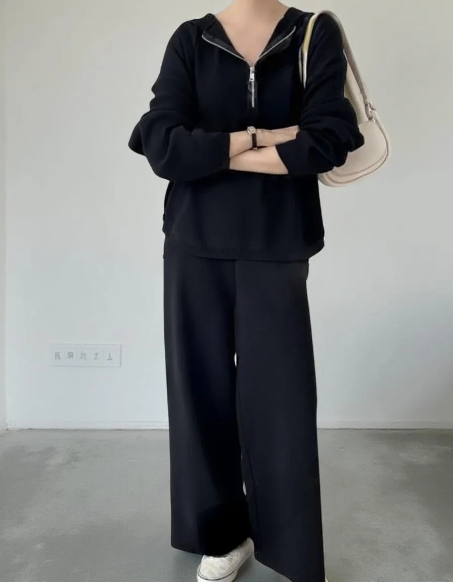 Rib-Knit Hooded Lounge Set — A half-zip hooded rib-knit top with matching wide-leg trousers. Mocha, black or beige. One
