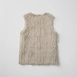 Whisper Soft Faux Fur Vest — A short faux fur vest with a fine, soft pile and an open front. Cut to a US medium. Cruelty